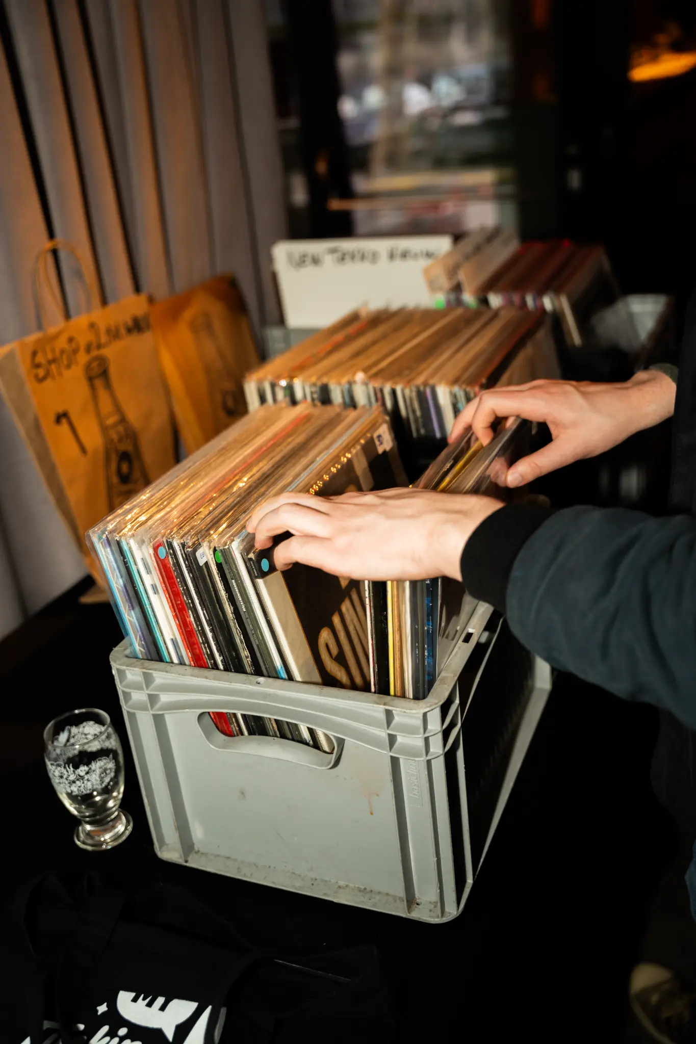 Visitors browsing vinyl records